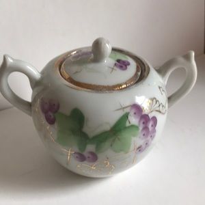Vintage hand painted porcelain sugar bowl.